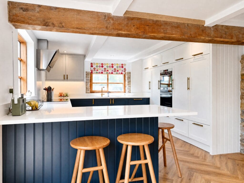 Colourhill navy shaker kitchen with oak beams