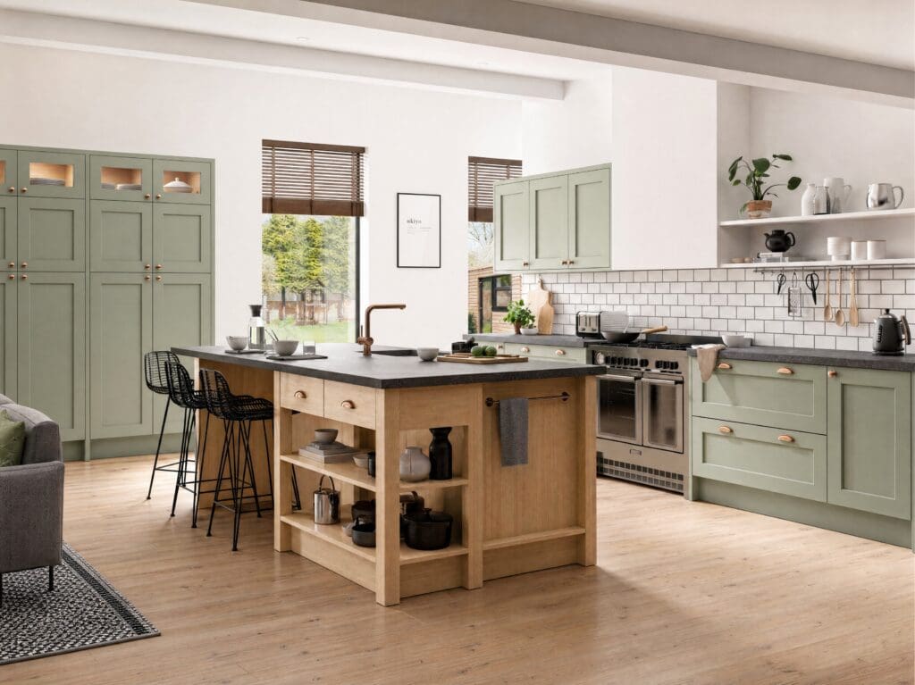 Sage shaker kitchen with oak island by Colourhill